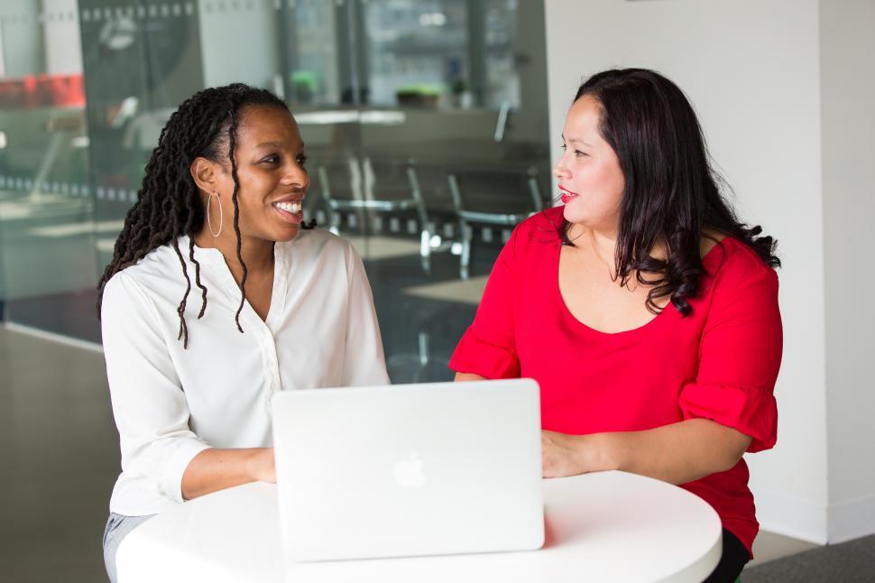 Free Image of Happy business women with laptop 