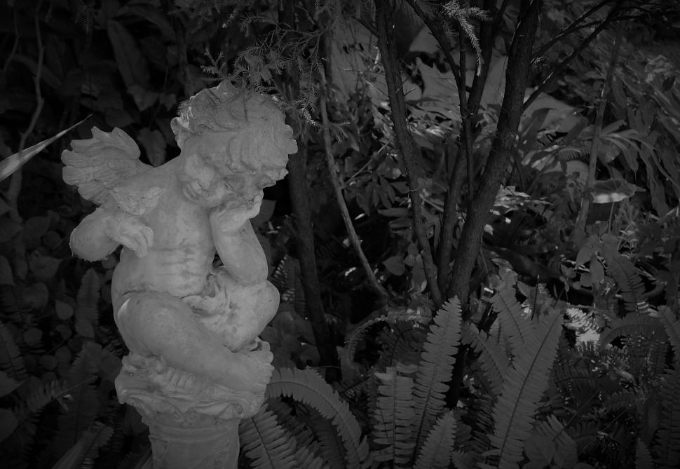 Free Image of Angel Boy Statue in Black and White  