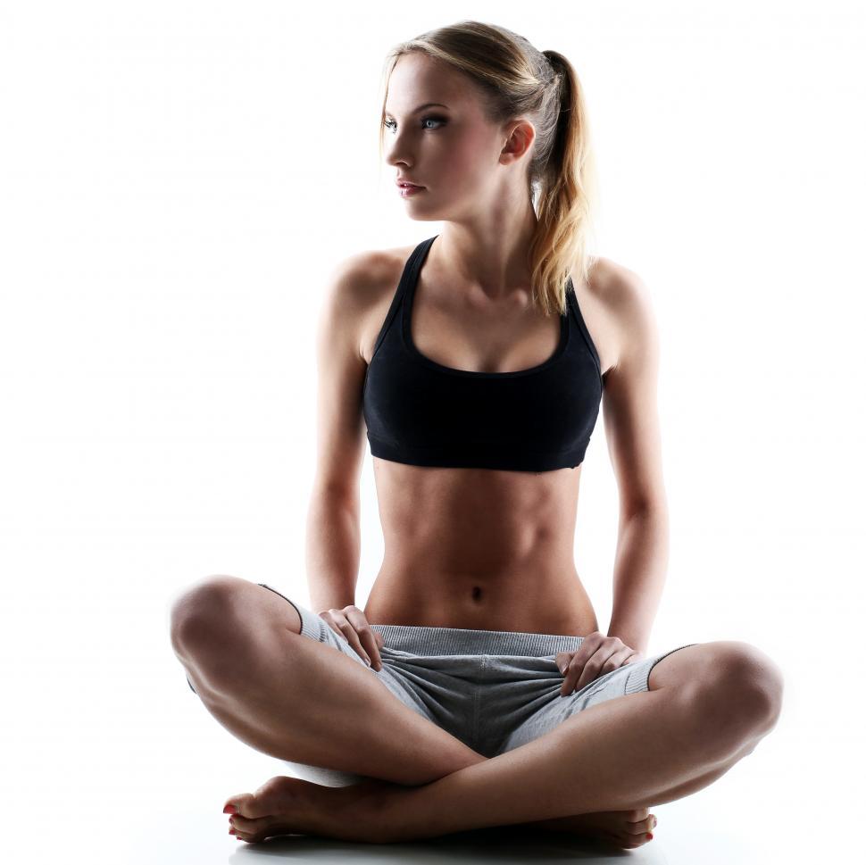 Free Image of Woman sitting with crossed legs 