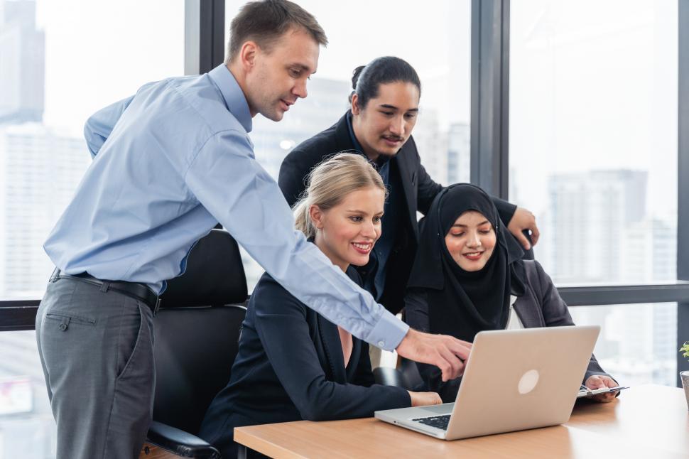 Free Image of Group of young business people working and communicating 