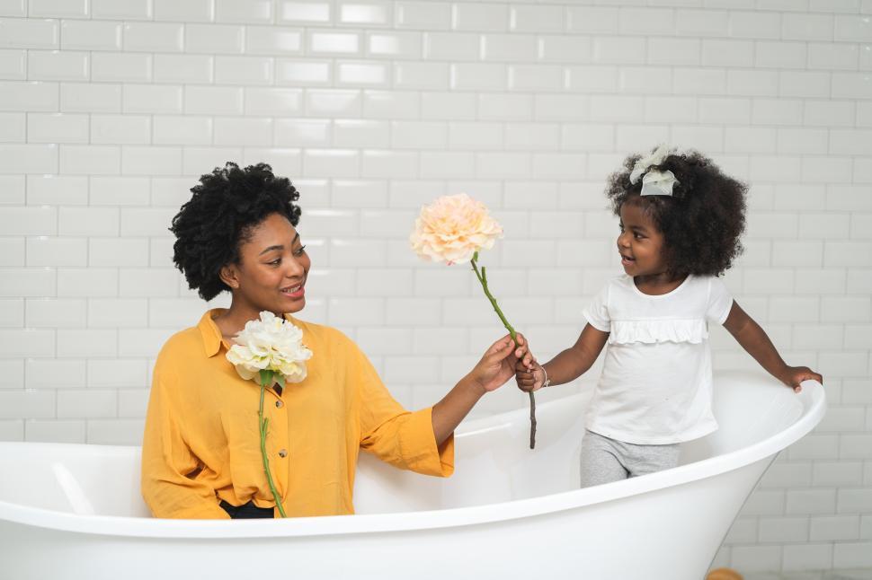 Free Image of Happy mother and baby daughter having fun 
