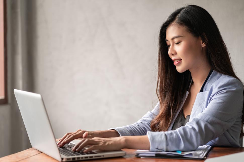 businesswoman-in-blue-shirt-working-from-home.jpg