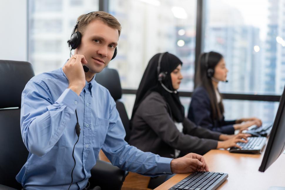 Free Stock Photo of Young man customer service agent with headset ...