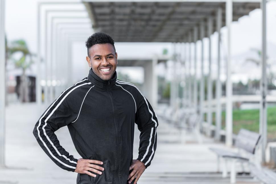 Free Image of Black personal trainer looking at camera 