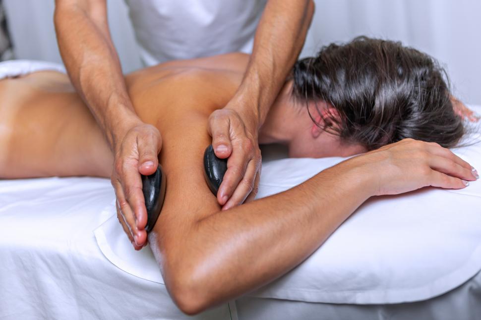 Free Stock Photo of Side view of young woman having arm massage