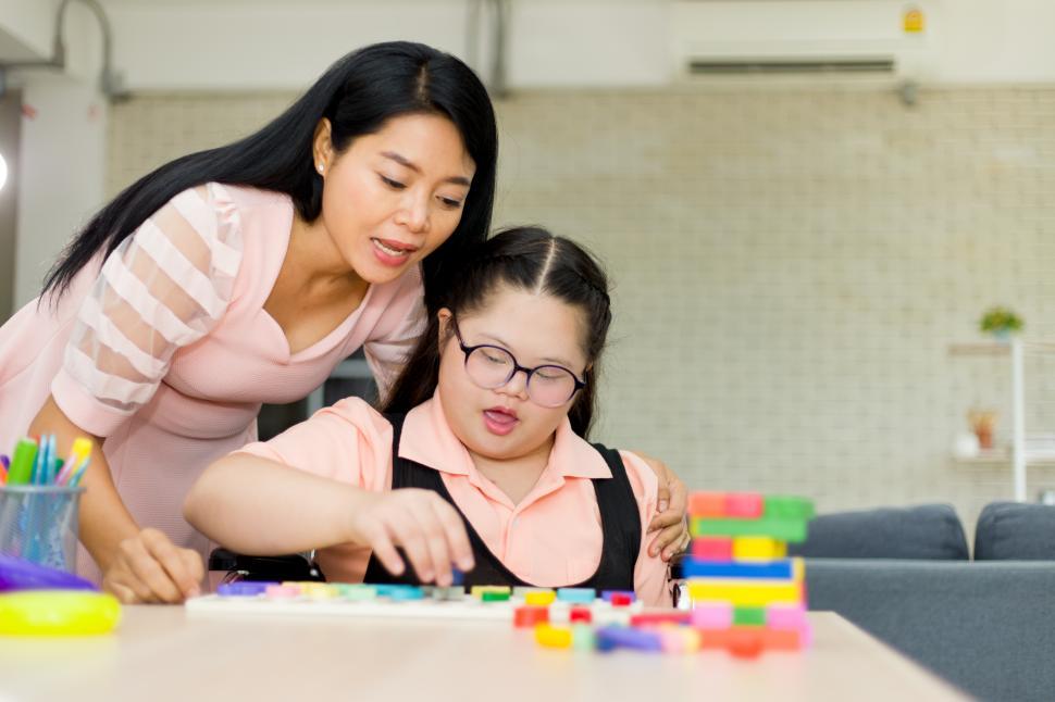 Free Stock Photo of Girl with learning challenges working at home ...