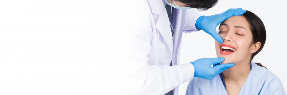 Free Image of The dentist is examining dental health 