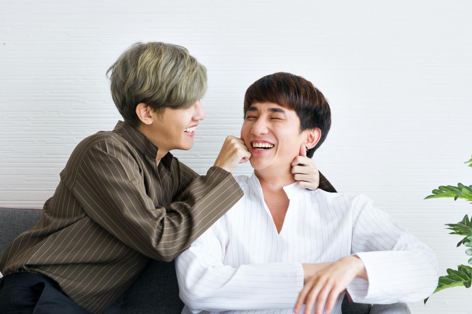 Free Image of Gay couples in a playful moment 