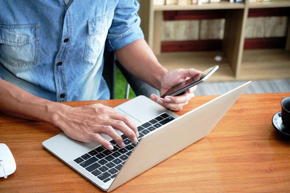Free Image of Hands of an Entrepreneur is typing a keyboard 