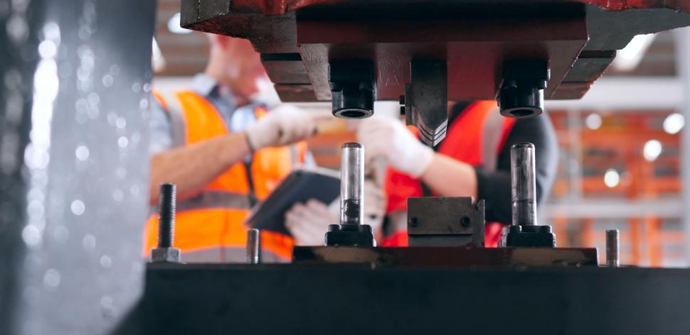 Free Image of Industrial printing presses with metal factory engineers 