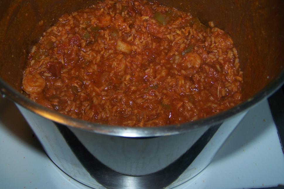 Free Image of Metal Bowl Filled With Food on Stove 