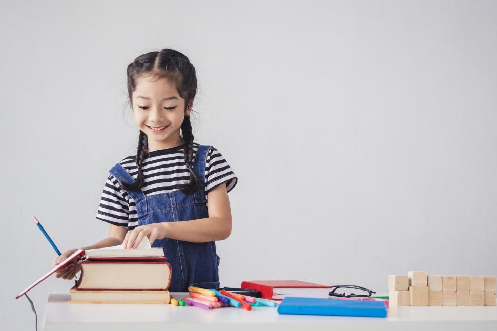 Happy kid with open book