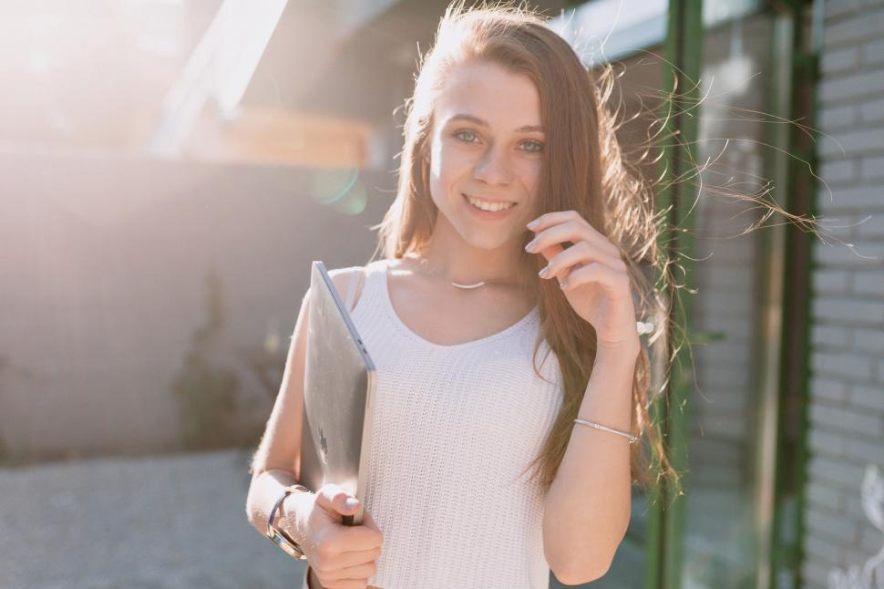 Free Image of Happy charming female student preparing for study 