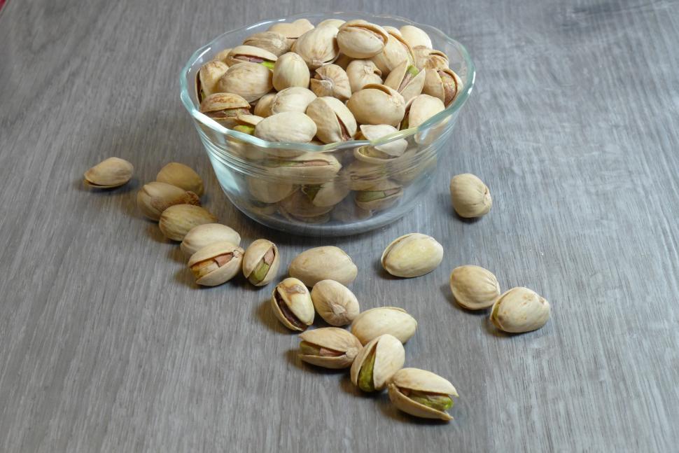 Premium Photo  Pistachio nuts in white bowl