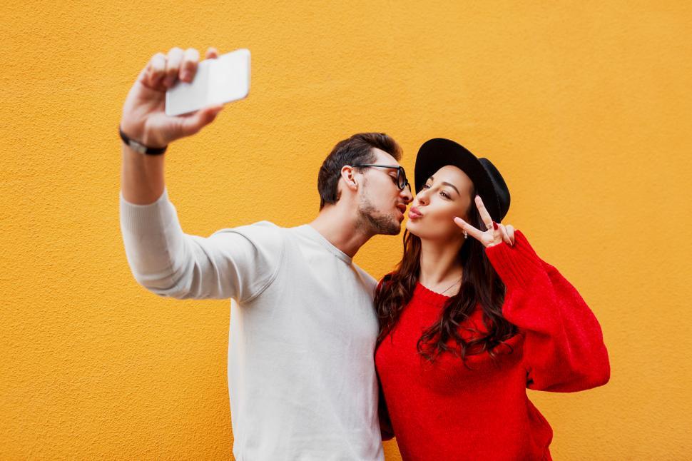 Free Stock Photo of Happy girl with her boyfriend making self portrait ...