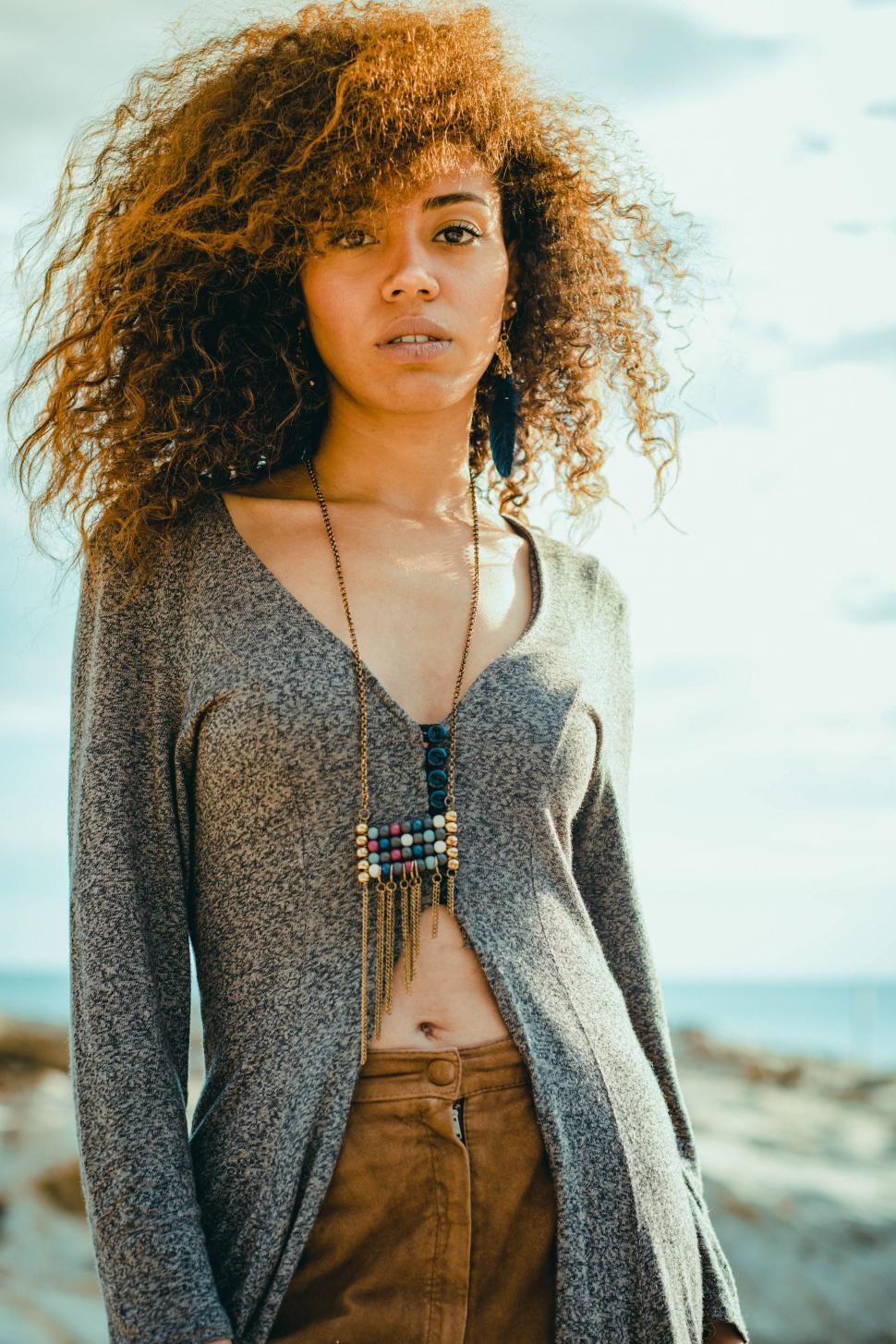 Free Image of girl in an dress at the shore 