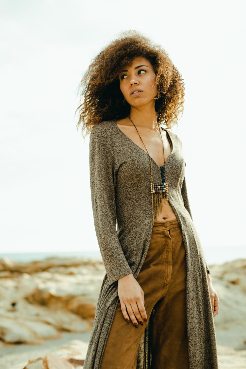 Free Image of black girl by the shore 