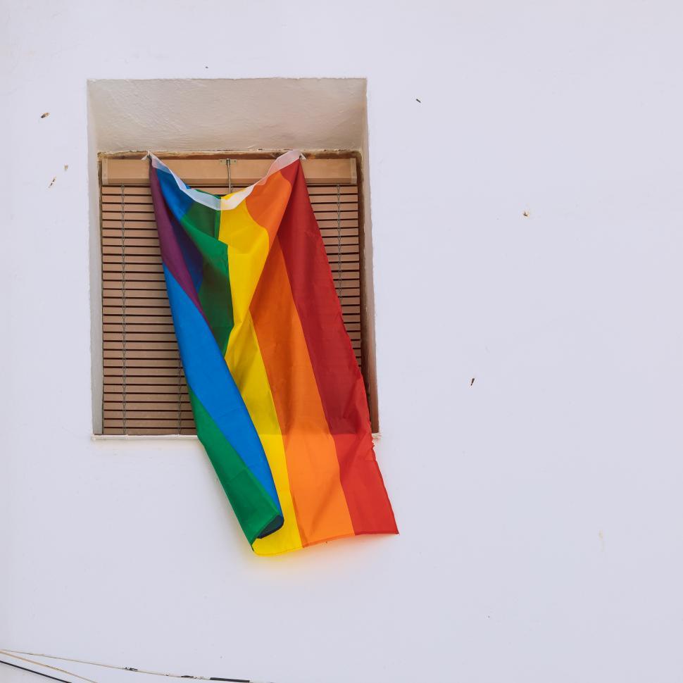 Free Image of rainbow lgtbi flag in a street 