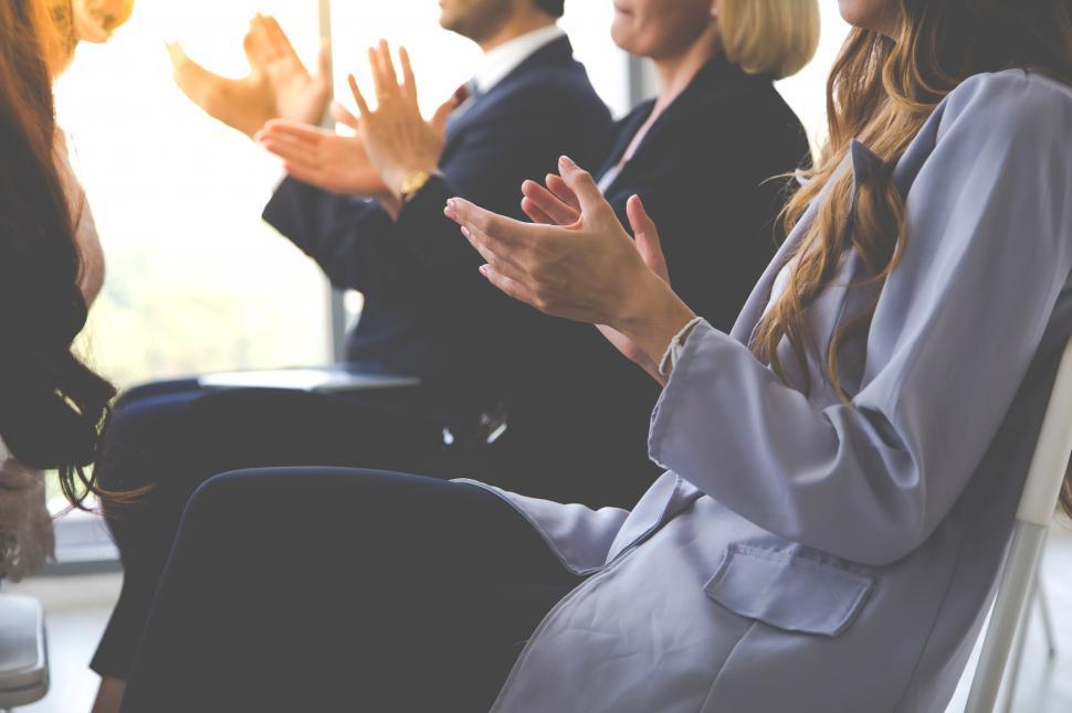 Free Image of Audience applauding at a business seminar 
