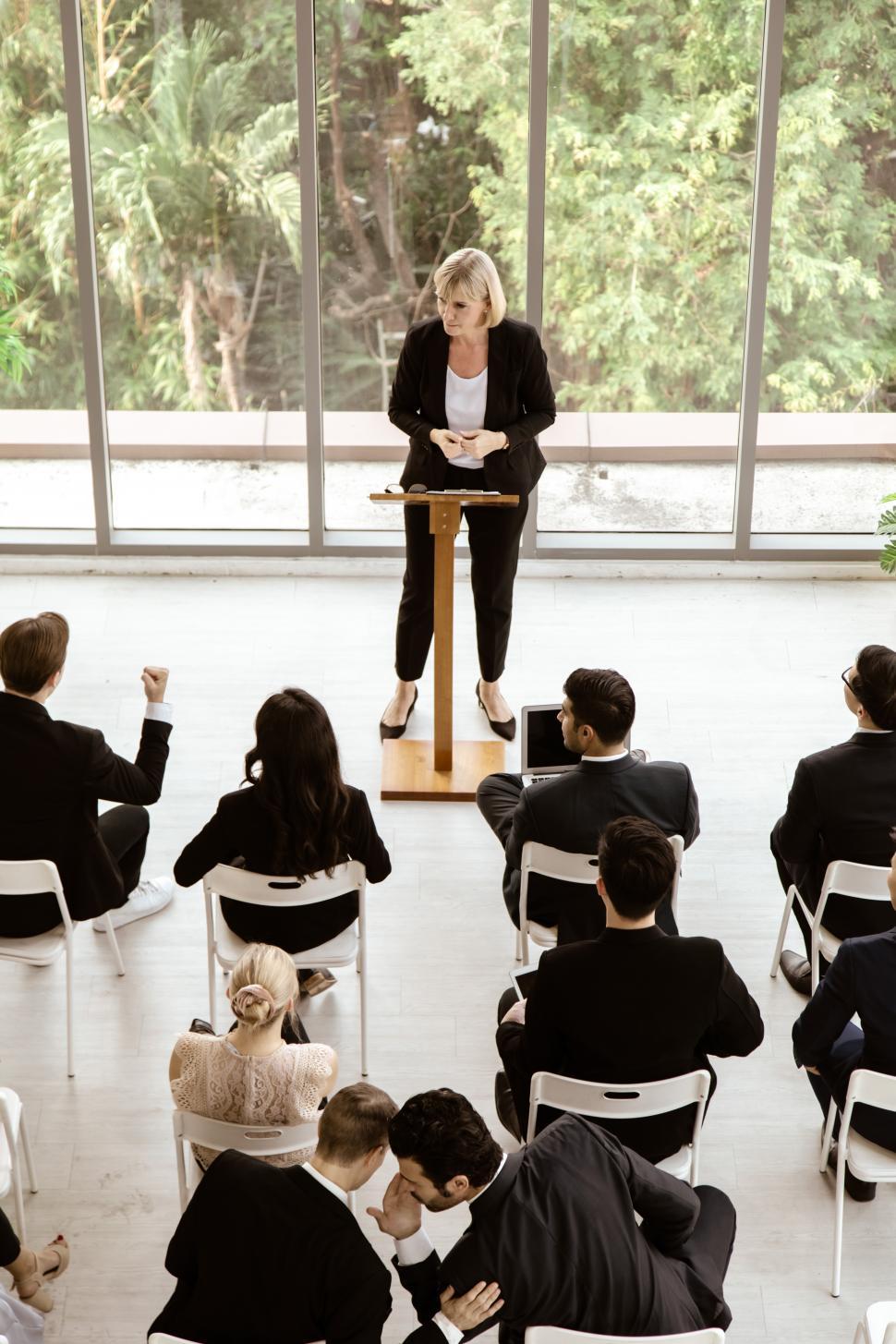 Free Image of Top view. Senior businesswoman speaker 