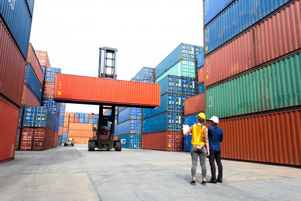 free-stock-photo-of-man-manager-and-woman-supervisor-in-cargo-dock