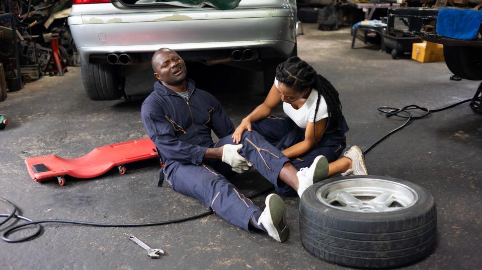 Mechanic injured on the job getting help