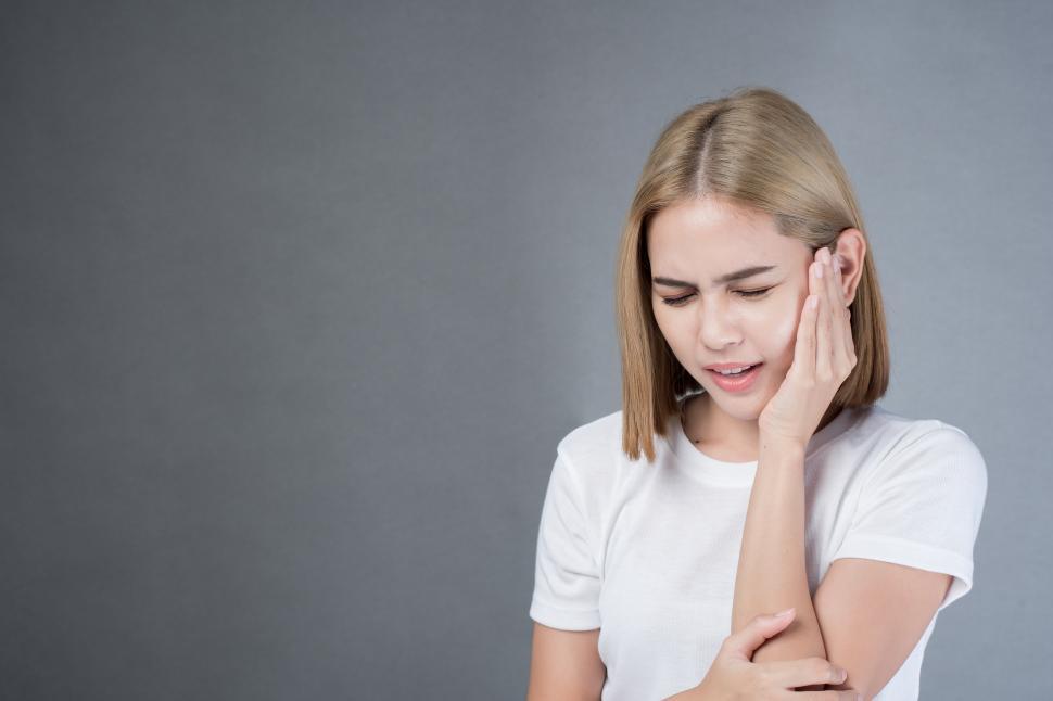 Free Stock Photo of woman with a toothache, sensitive teeth or jaw pain Download Free Images