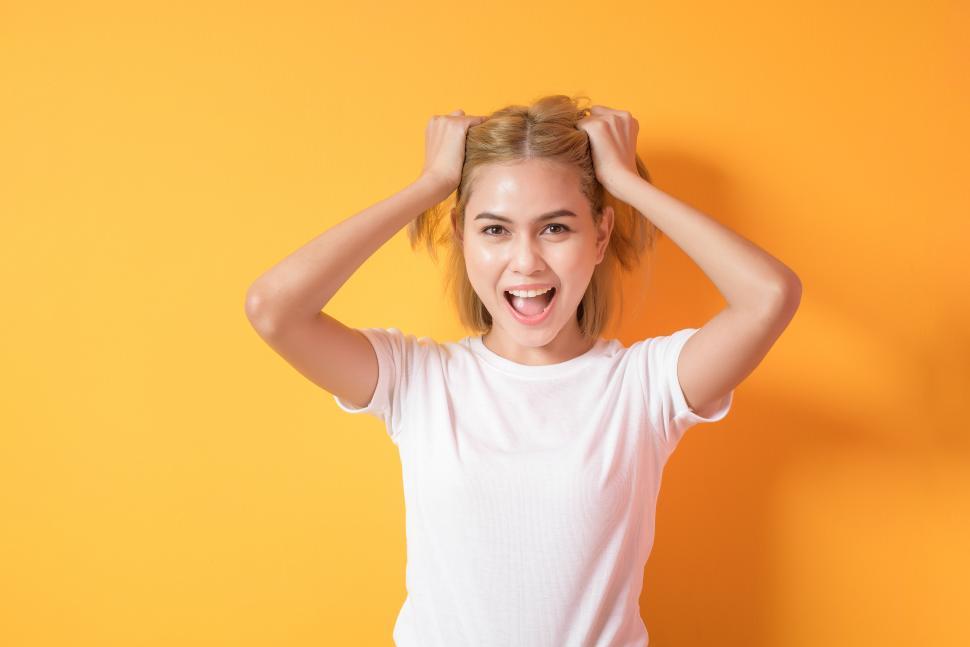 Free Image of portrait of short blonde hair woman in studio 