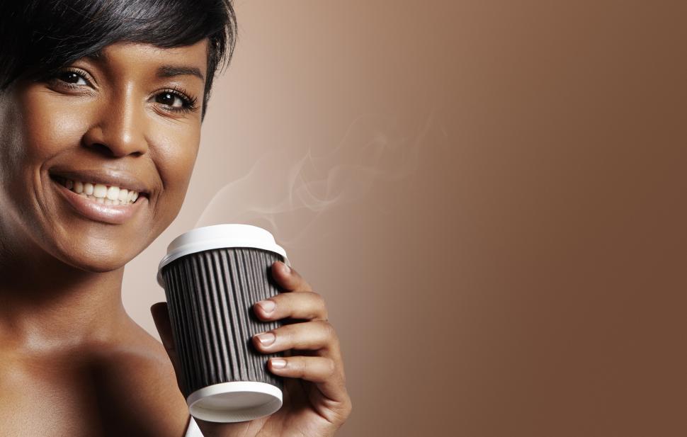 Woman Drinking Coffee Out Of A Paper Cup Stock Photo, Picture and