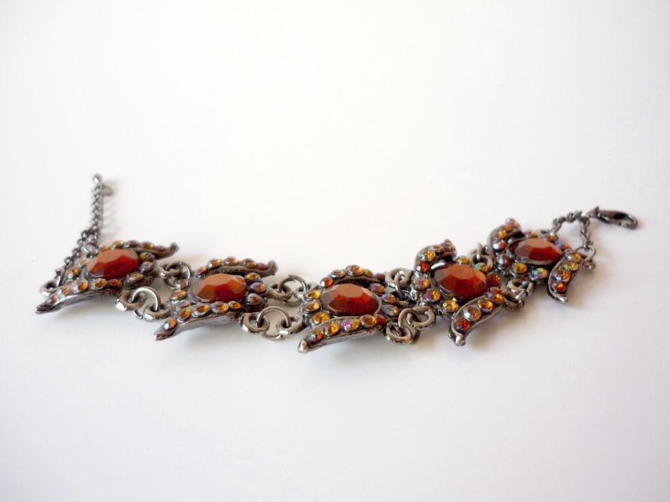 Free Image of Necklace With Orange Stones on White Background 