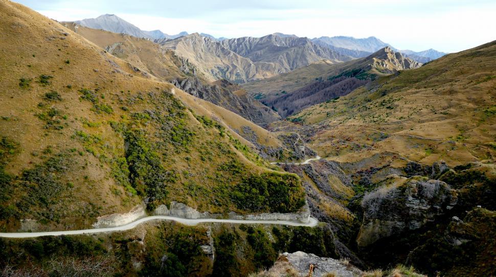 Free Image of A winding road through a valley 