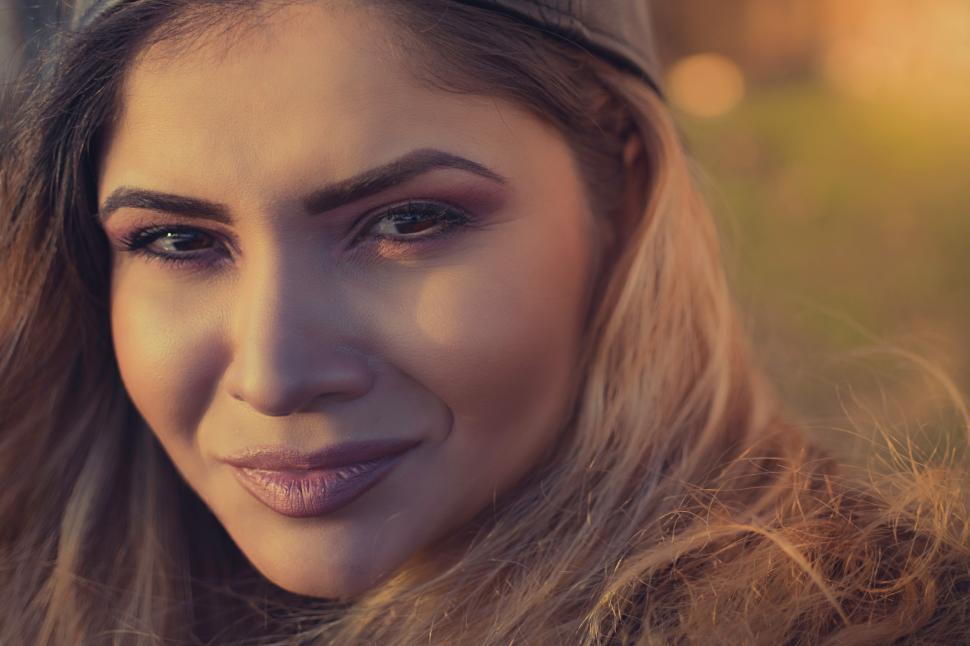 Free Image of A woman smiling at the camera 