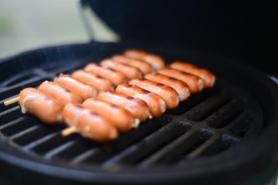 Free Stock Photo of A group of sausages on a grill Download Free