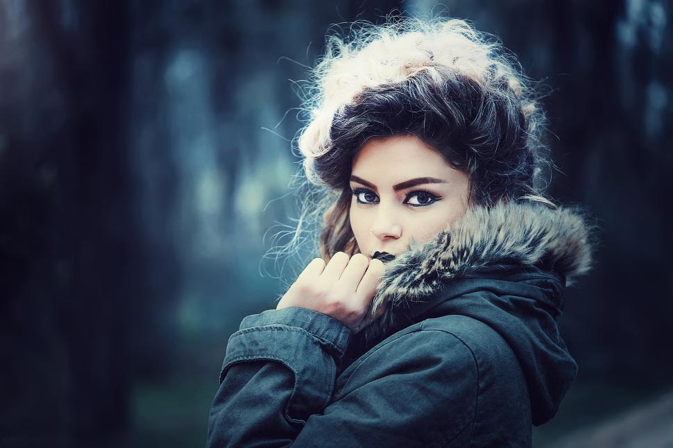 Free Image of A woman with black lipstick and fur coat 