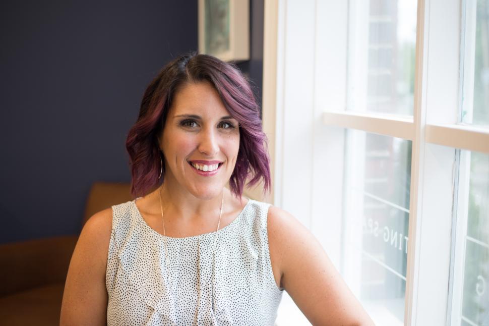 Free Image of A woman smiling at camera 