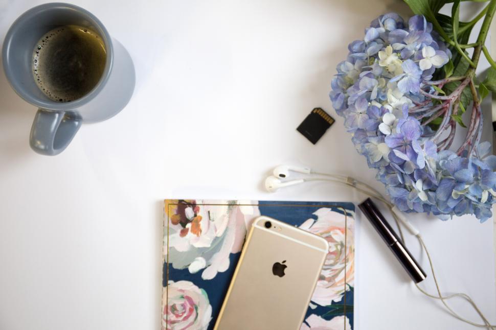 Free Image of A phone and a cup of coffee 