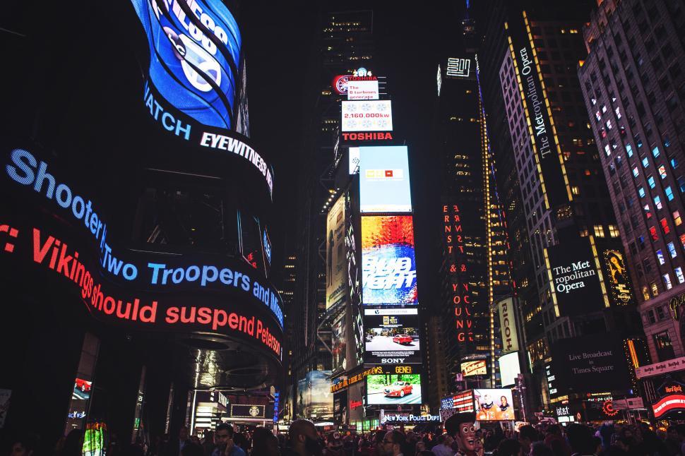 Free Image of A group of people in a city 
