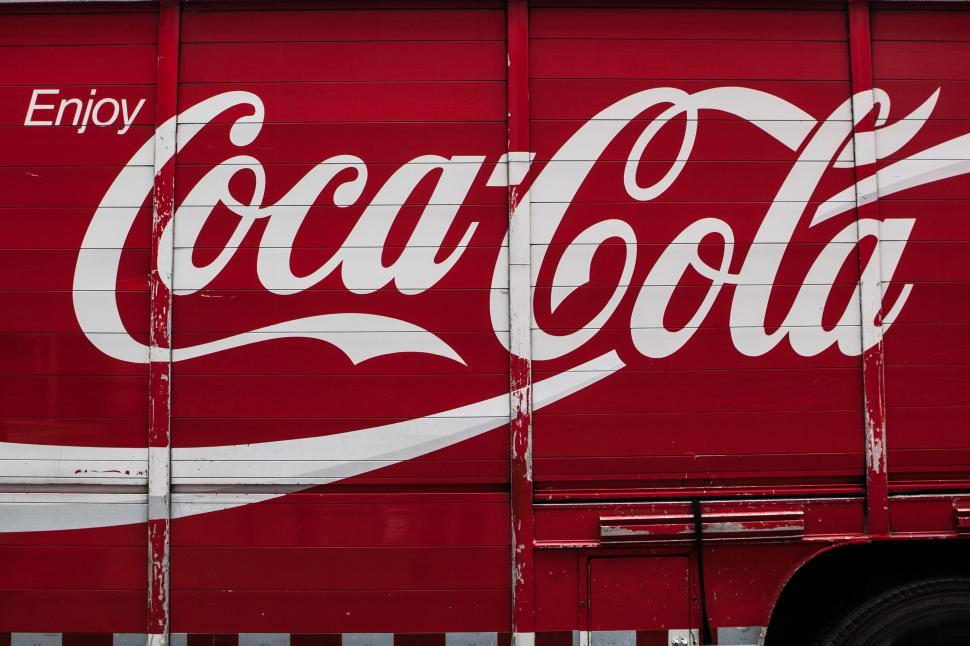 Free Image of A red truck with white text on it 