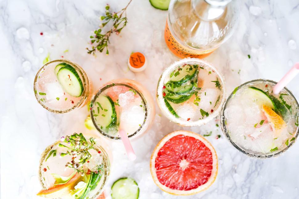 Free Image of A group of drinks on a marble surface 