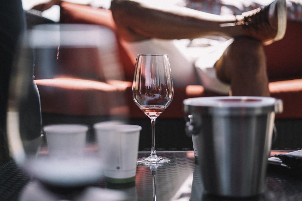 Free Image of A wine glass on a table 
