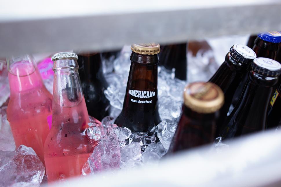 Free Image of A group of bottles in ice 
