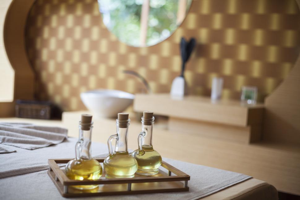 Free Image of A group of bottles of oil on a tray 
