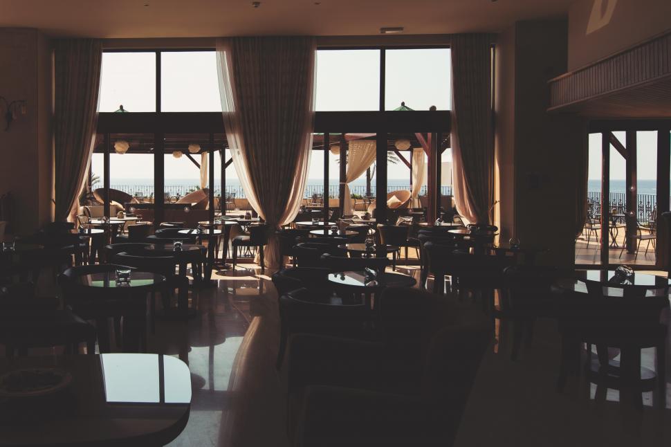 Free Image of A room with tables and chairs 