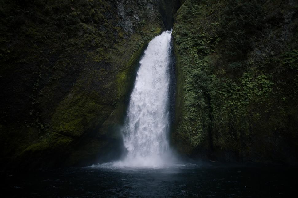 Free Image of A waterfall in a forest 