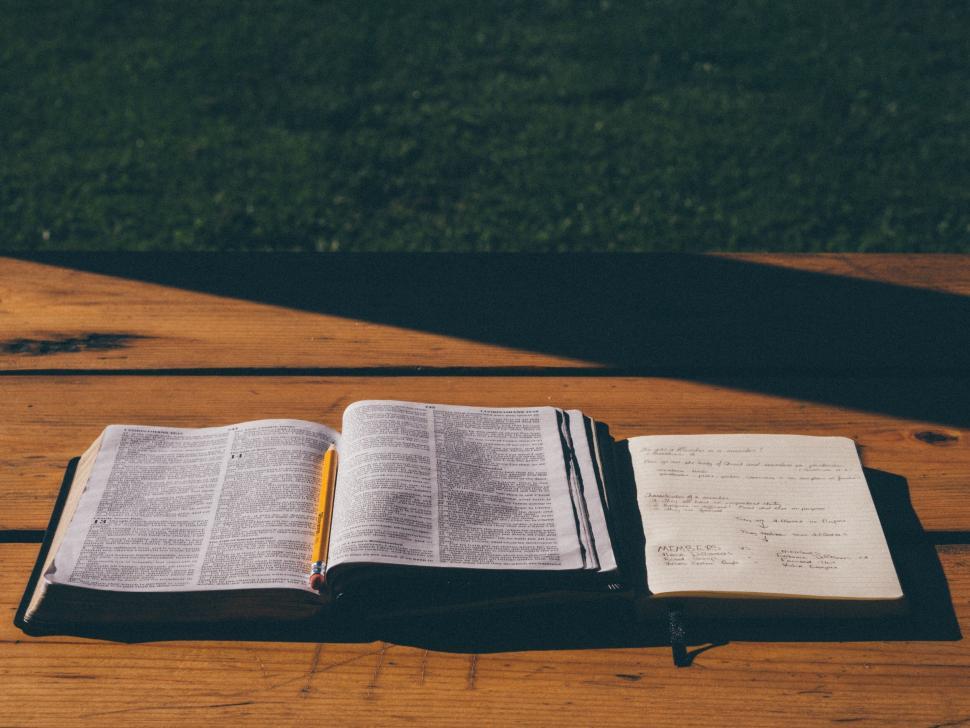 Free Image of A book and pencil on a table 