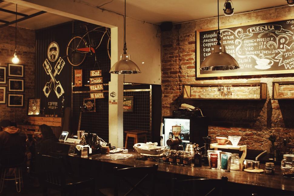 Free Image of A room with a counter and a brick wall 