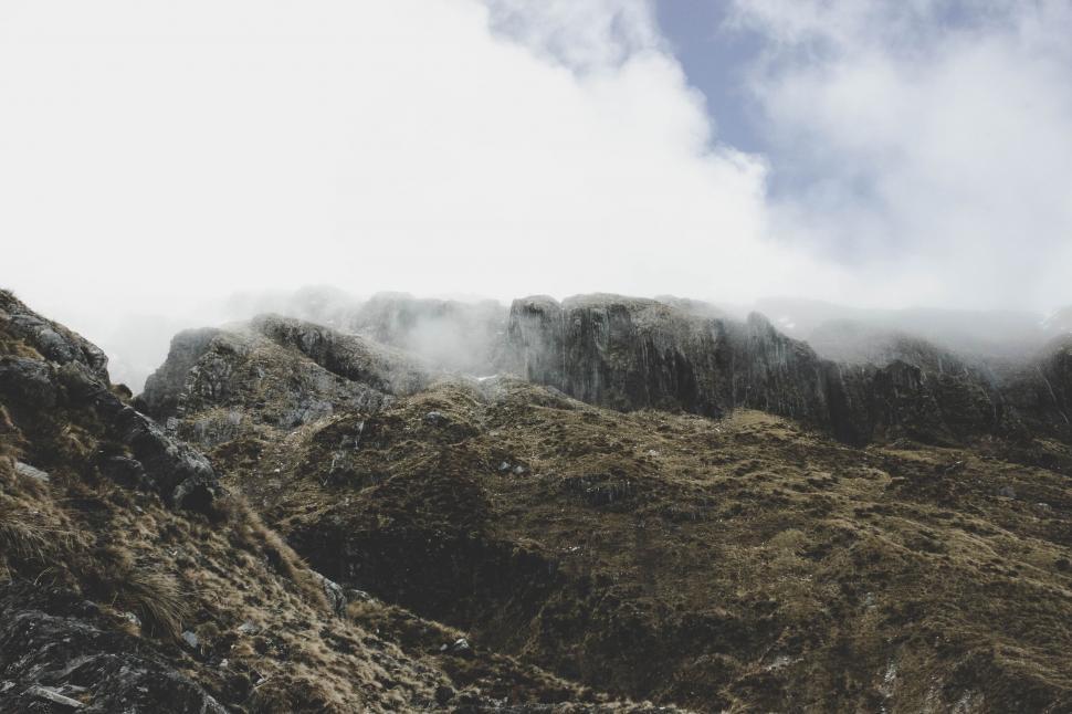 Free Image of A rocky mountain with clouds 