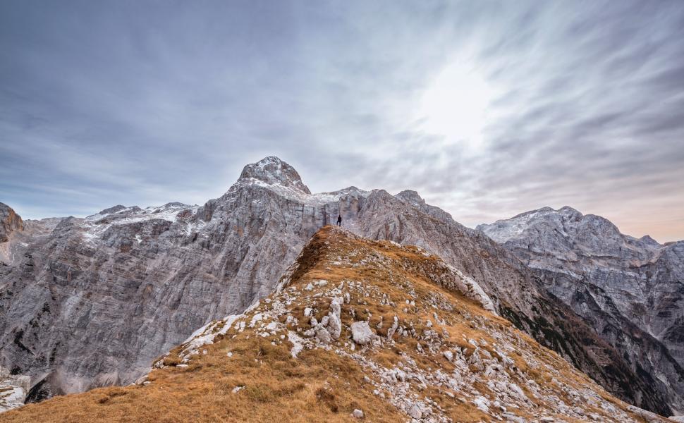 Free Image of A person standing on a mountain 
