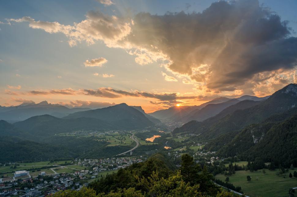 Free Image of A landscape with mountains and a city 