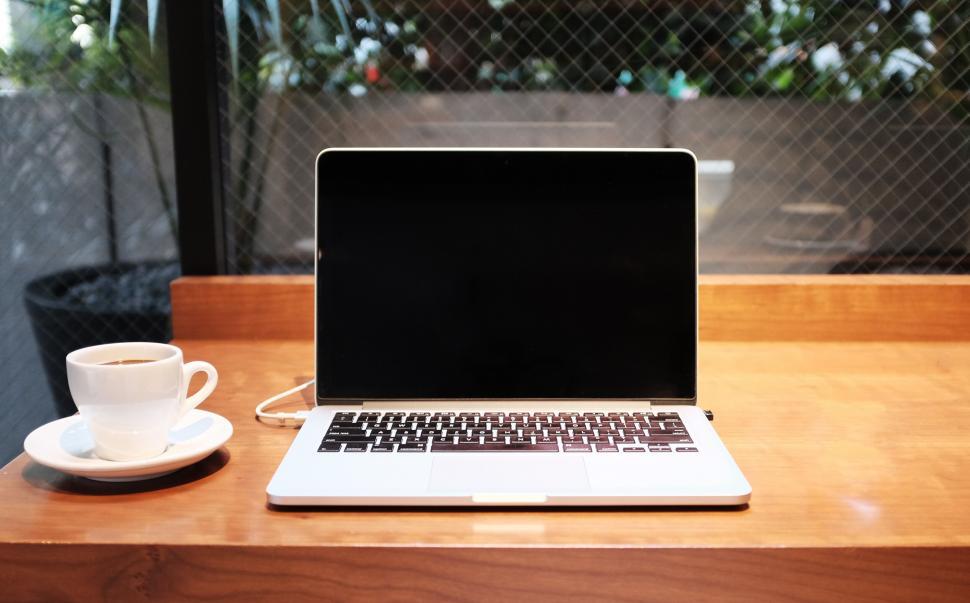 Free Image of A laptop on a table 